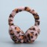 A detachable memory hair band with leopard print plush ear bags for both men and women to wear on the ear cups for winter warmth, windproof and frost-proof